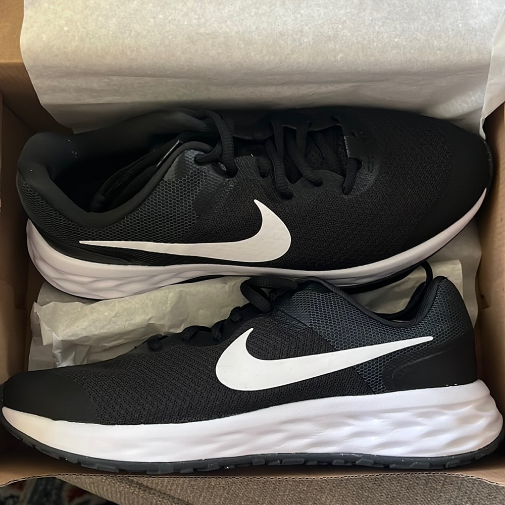 BRAND NEW NEVER WORN kids Nike running shoes